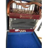 A cased vintage Tonella piano accordian, made in Gemany,