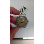 A military WW2 Omega wrist watch, (no strap) in working order.