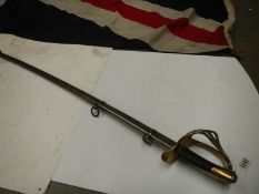 An early Sabre with brass hilt and steel scabbard. COLLECT ONLY.