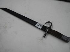 A pre WW1 bayonet with hooked quillion and with scabbard, blade 39.5 cm.