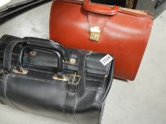A leather briefcase and one other.