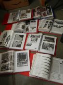 Eight folders of military subject photographs.