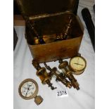 An old metal gas mask case containing gauges etc.,