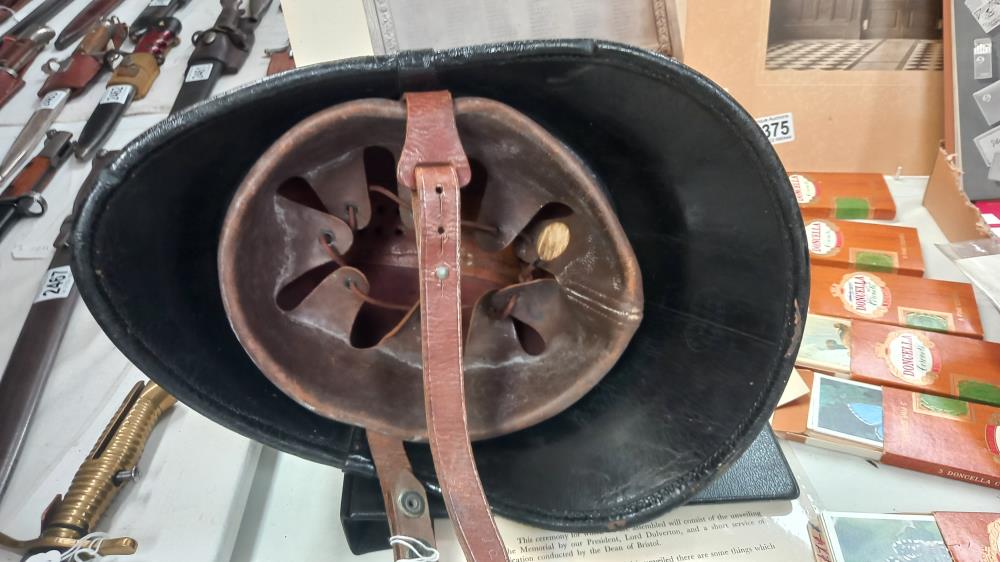 A late Victorian firemans helmet. - Image 7 of 8