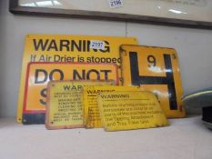 Five vintage metal warning signs.