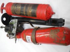 Two old fire extinguishers, The National Fire Protection and Pyrene.
