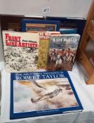 A selection of books on military artwork including Robert Taylor etc