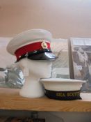 A Royal Marine cap size 56 and a sea scout cap size 55.