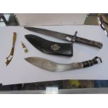 A WW1 Combles trench art letter opener, shell case with cross, WW2 bayonet and a Kukri.