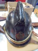A late Victorian firemans helmet.