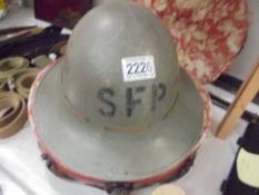 A Zuckerman helmet (Supplementary Fire Partie WWII).