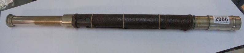 An early 20th century naval telescope, makers mark indistinct, total length 62.5 cm.