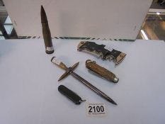 An item of trench art, three vintage pen knives etc.,