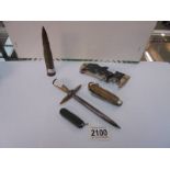 An item of trench art, three vintage pen knives etc.,