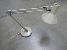 A vintage angle poise lamp.