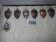 A quantity of USSR cap badges.