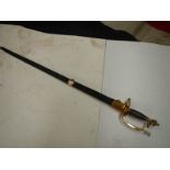 An early sword with brass hilt and in scabbard. COLLECT ONLY.