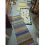 Three middle eastern prayer rugs.