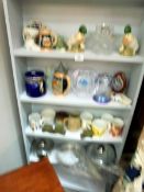 Five shelves of ceramics, glass and three stainless steel pans, COLLECT ONLY.