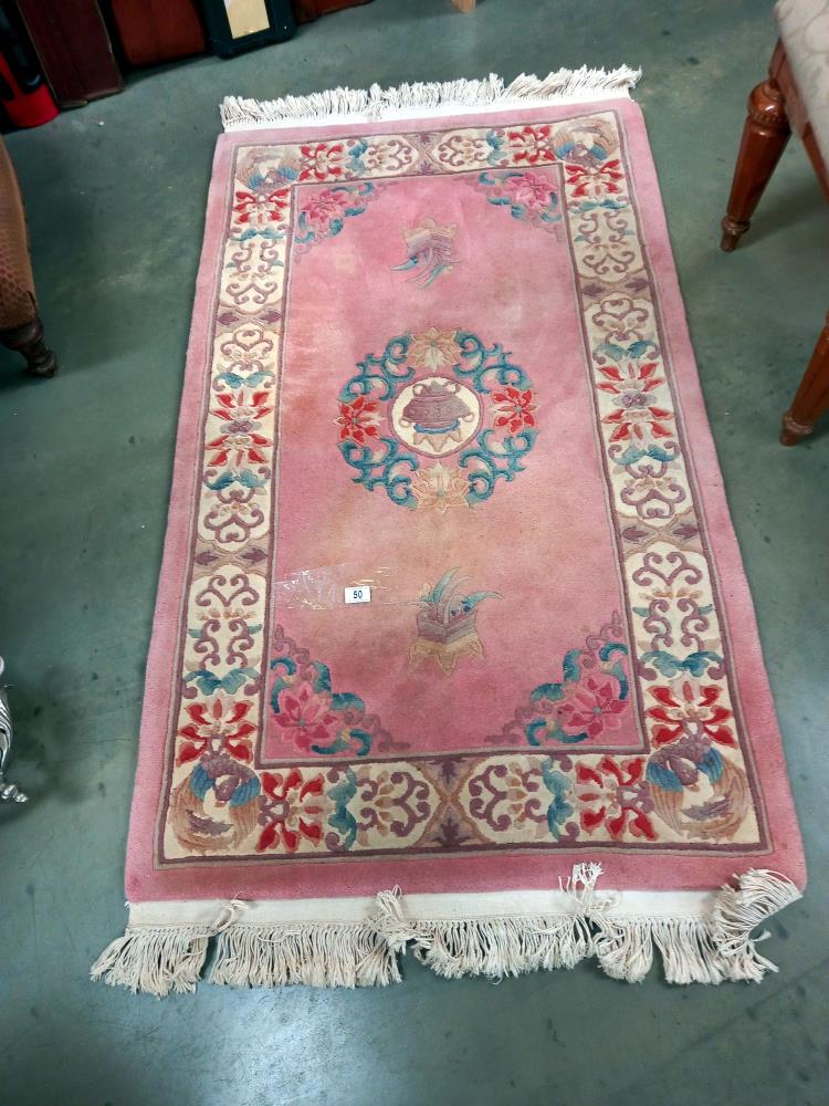 A pink wool rug, COLLECT ONLY.