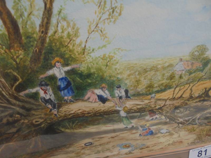 A framed and glazed watercolour featuring children at play, signed but indistinct. - Image 2 of 3