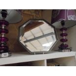 An octagonal bevel edged mirror, COLLECT ONLY.