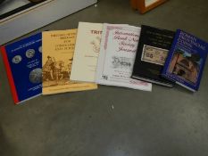 Six books relating to medals and coins.