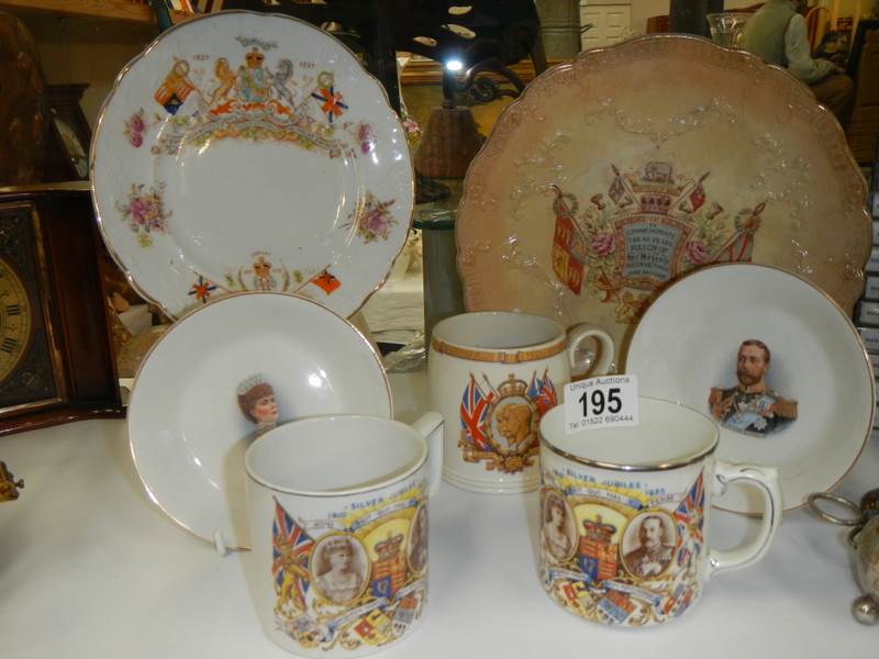 A quantity of commemorative cups and plates.