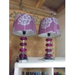 A pair of red table lamps with shades. COLLECT ONLY.