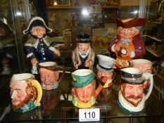 Six Doulton character jugs, a Doulton Churchill jug and two Toby jugs.