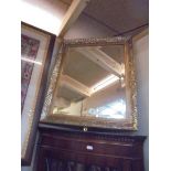 A gilt framed bevel edged mirror, COLLECT ONLY.