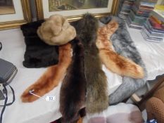 Five fur stoles, four fur hats and two fur cuffs.