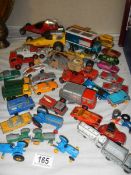 A mixed lot of play-worn die cast vehicles.