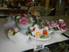 A quantity of porcelain floral posies.