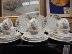 An eighteen piece tea set decorated with Geisha girls, COLLECT ONLY.