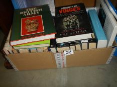 A box of books including military. COLLECT ONLY.