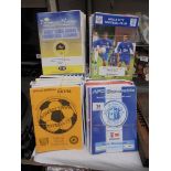 A large quantity of football programmes.