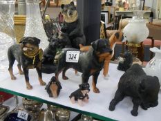 A quantity of Rotwieler figure, boxer dog, bear etc.,
