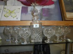 A cut glass decanter and six cut glass brandy goblets, COLLECT ONLY.