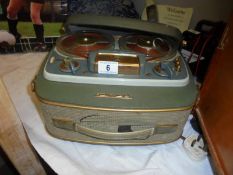 A Grundig reel to reel tape recorder.