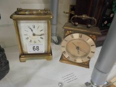 A brass carriage clock and one other.