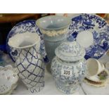 Two blue and white plates, two vases and a lidded jar,. COLLECT ONLY.