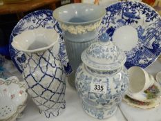 Two blue and white plates, two vases and a lidded jar,. COLLECT ONLY.