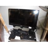 A Logic television with remote and DVD player., COLLECT ONLY