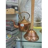 A Victorian copper kettle and a copper washing posher.