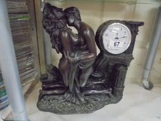 A figural battery clock.