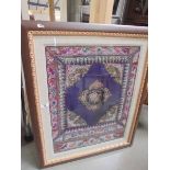 A framed and glazed Asian embroidered panel. COLLECT ONLY.