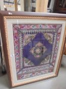 A framed and glazed Asian embroidered panel. COLLECT ONLY.