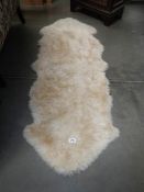 A sheepskin rug.