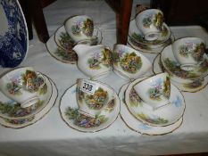 A thatched cottage tea set, COLLECT ONLY.